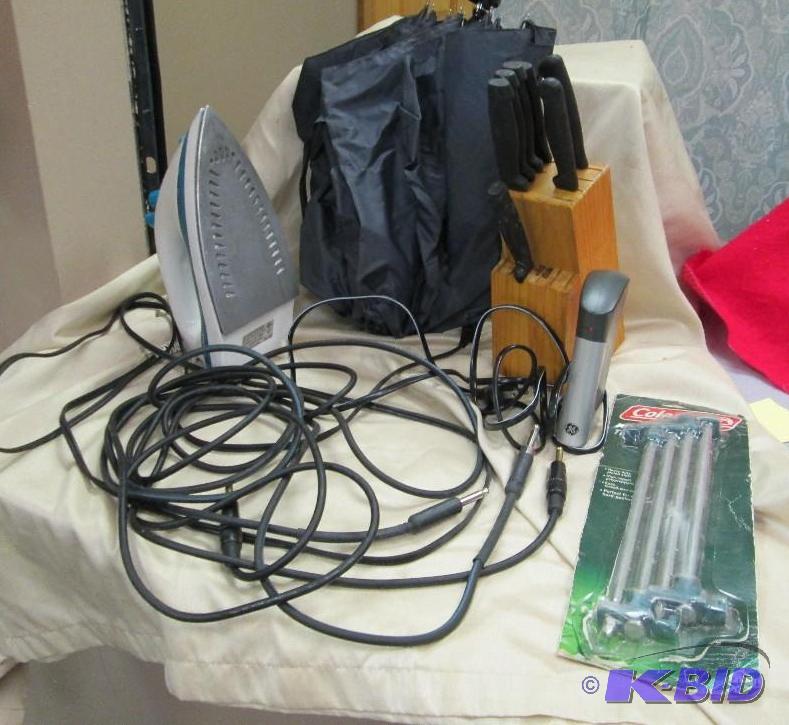 lot 39 image: Coleman 10" steel tent pegs, umbrella, t...