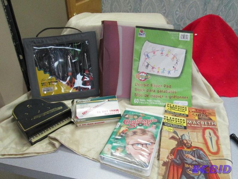 lot 50 image: Doodle paper pad, A Christmas Story tape, bin...