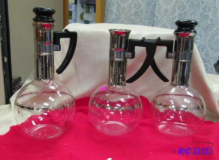 lot 53 image: Qty 3 nice glass container to put liquid stuf...