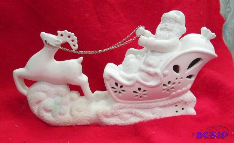 lot 68 image: White Santa in his sleigh flying with his rei...