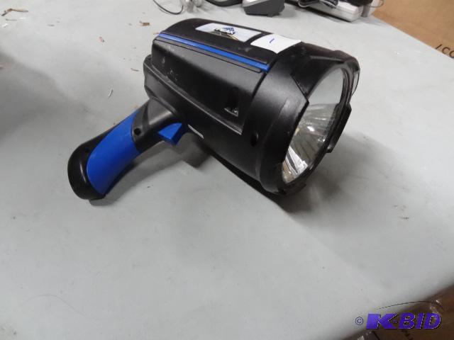 lot 1 image: Used peak brand handheld battery spotlight. 1...