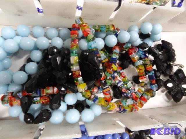 lot 133 image: Lot of 3 womens necklaces including one dichr...