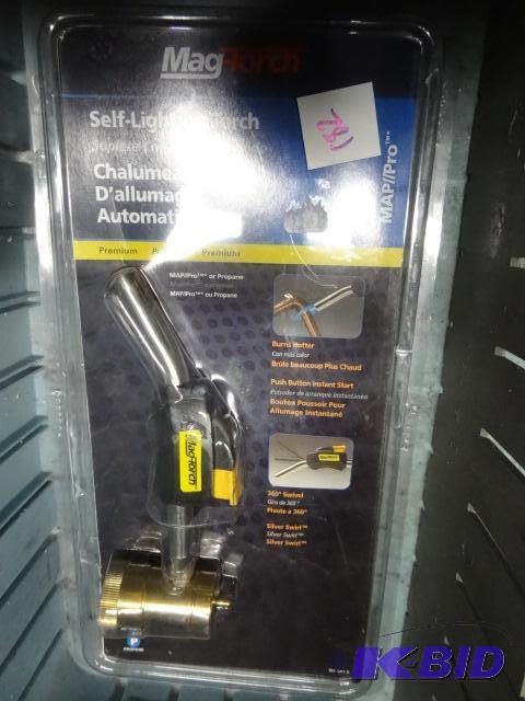 lot 182 image: New mag torch brand self lighting torch. For ...