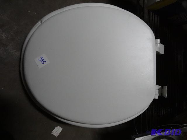 lot 325 image: New white padded round bowl toilet seat....