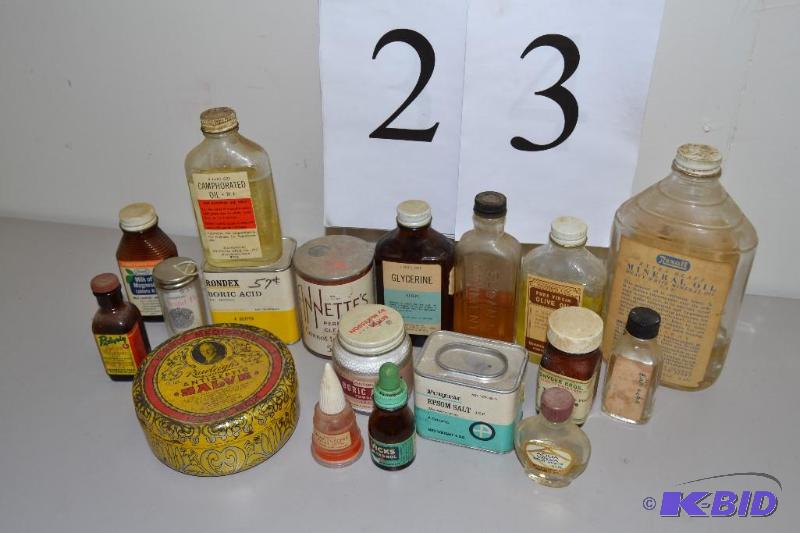 lot 23 image: Vintage bottles & tins