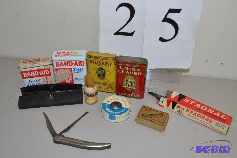 lot 25 image: Vintage tins, razor & brush