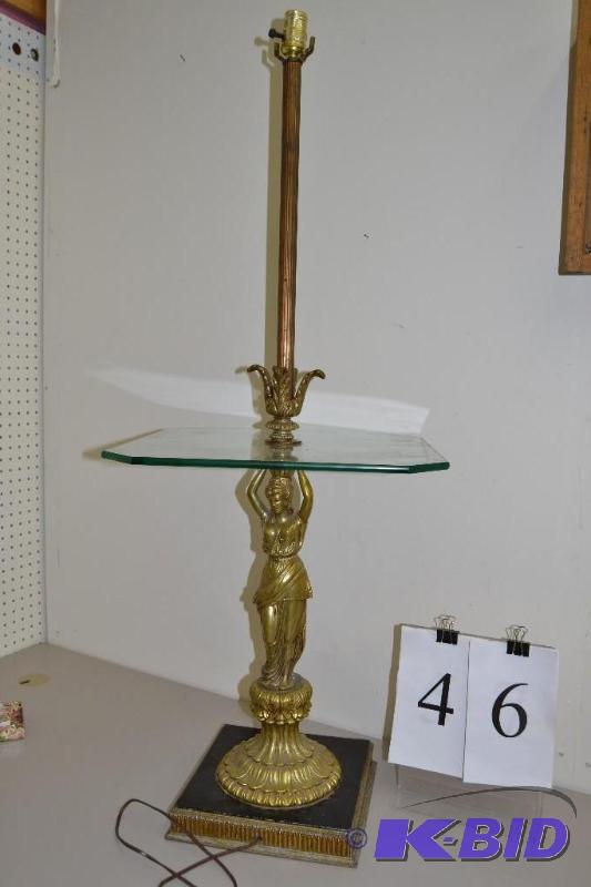 lot 46 image: Floor lamp with table