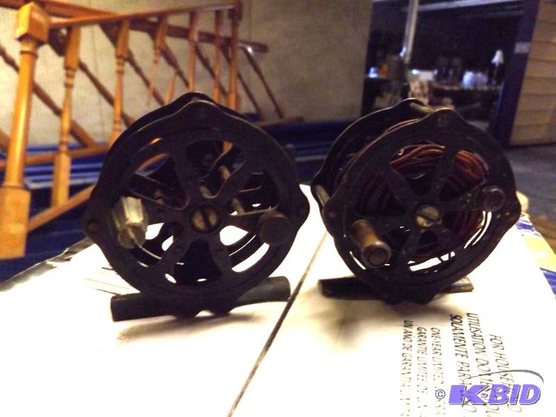 Two metal fishing reels, made in the USA...
