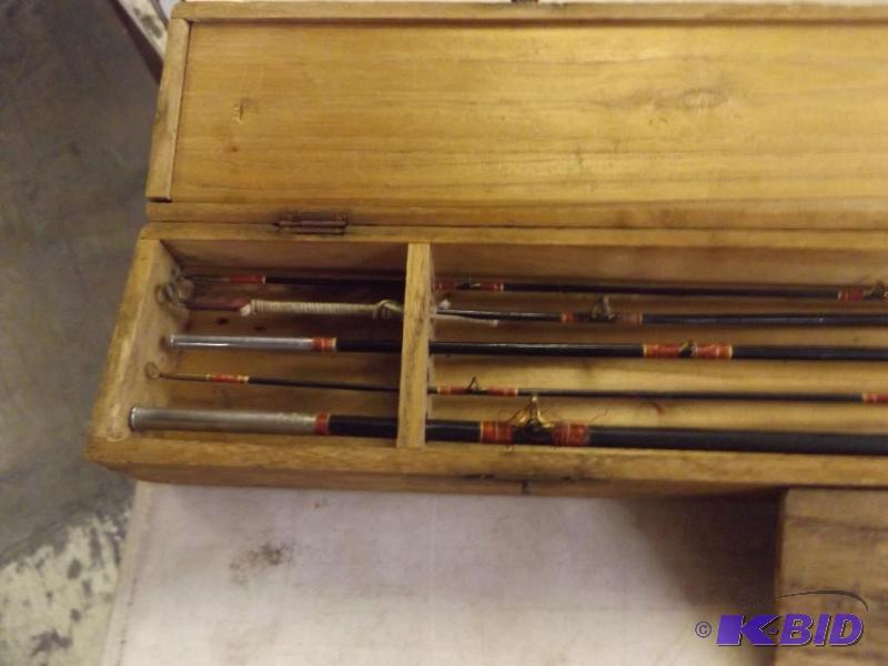 Bamboo fishing rod in box, box has damage...