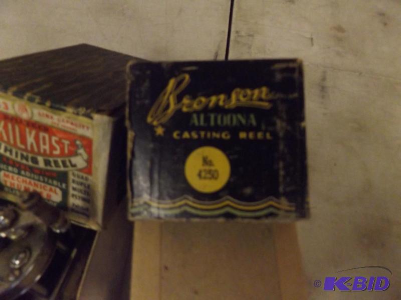 Skilkast Fishing Reel in box and a Bronson Ca...