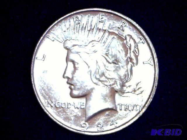 1924 Peace Dollar, no mint mark. See pictures...