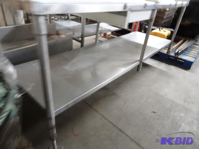 Stainless Prep Table with Top Cutting Boards....