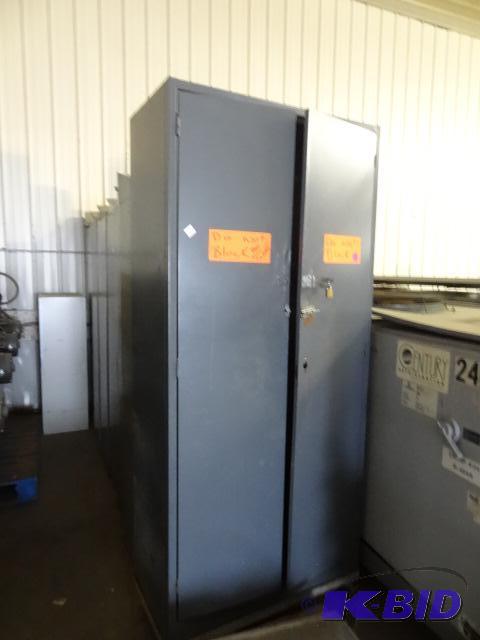 2 Door Metal cabinet. 3 shelves. 36 x 18 x 82...