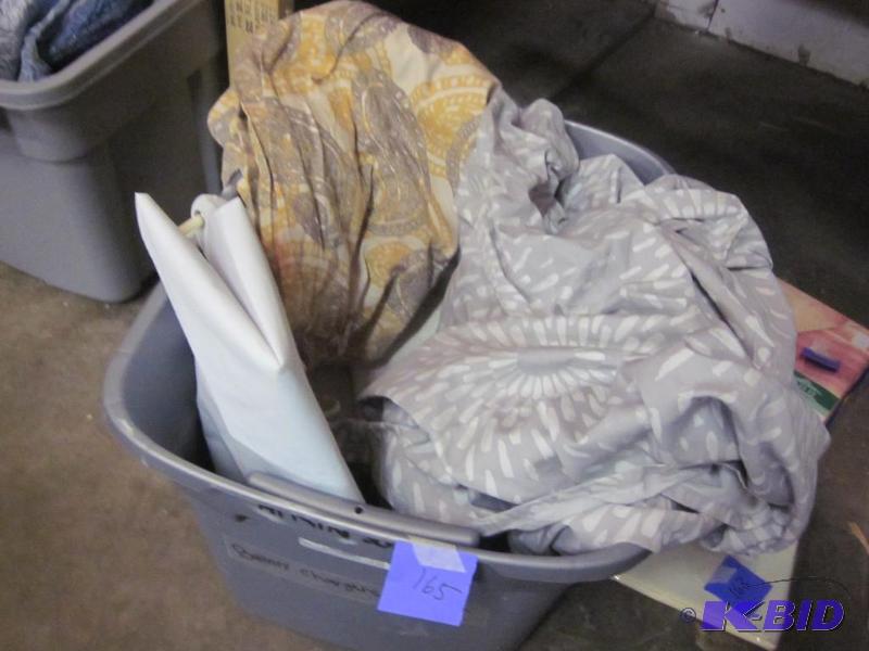 Bin full of shower curtains and liners.&nbsp...