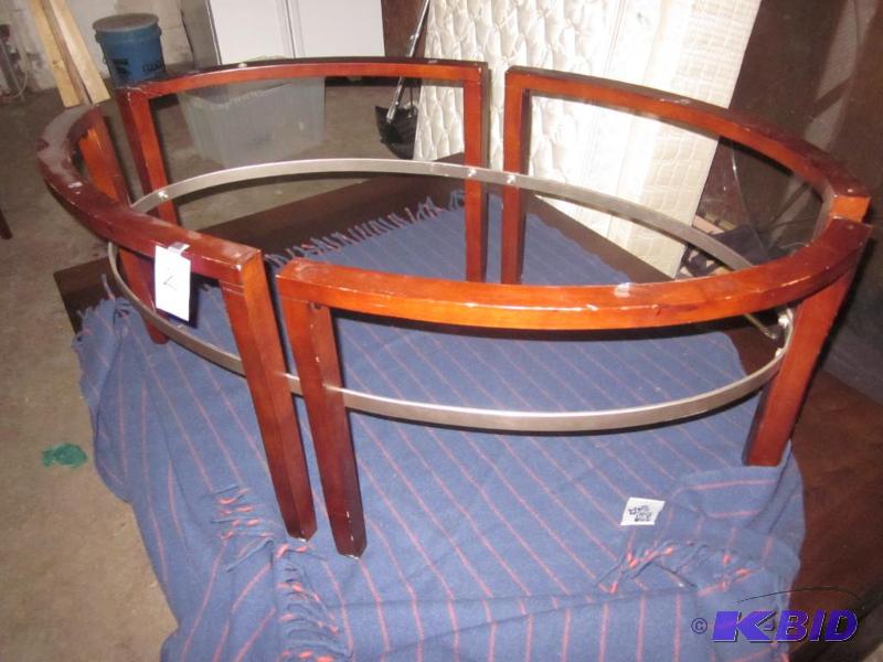 Wood and metal oval coffee table, missing gla...