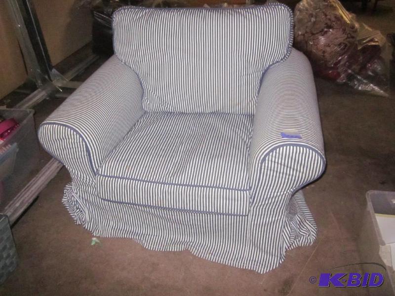 Blue and white stripped lounge chair.  &nbsp...