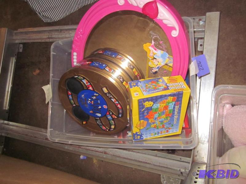 Bin of childrens games and mirror.  &nbsp  ...