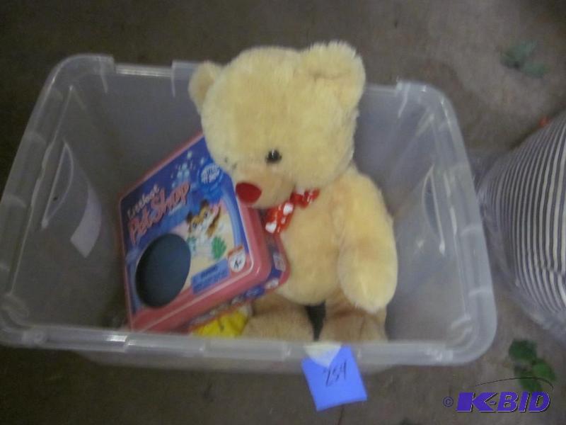 Bin with teddy bear and miscellaneous toys.&n...