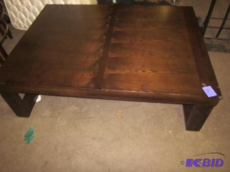42 inch X 56 inch X 17 tall brown wood coffee...