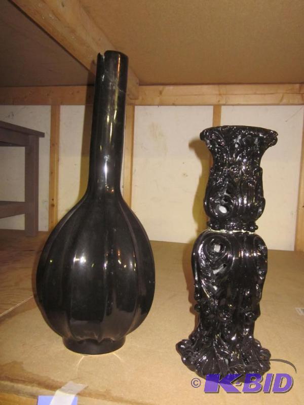 decorative vase with small chip and candle st...