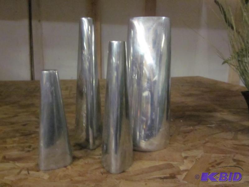 Lot of four metal flower vases.  &nbsp  &nbs...