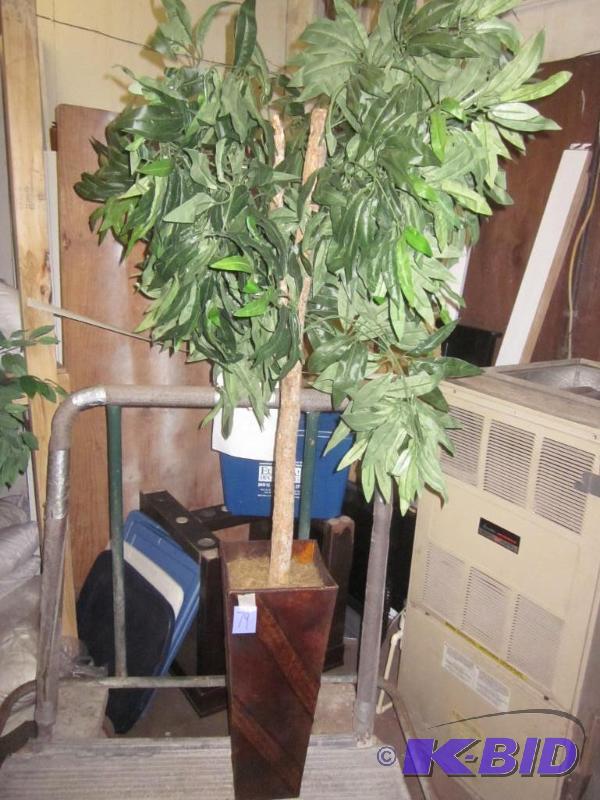 Artificial tree in planter.  &nbsp  &nbsp...