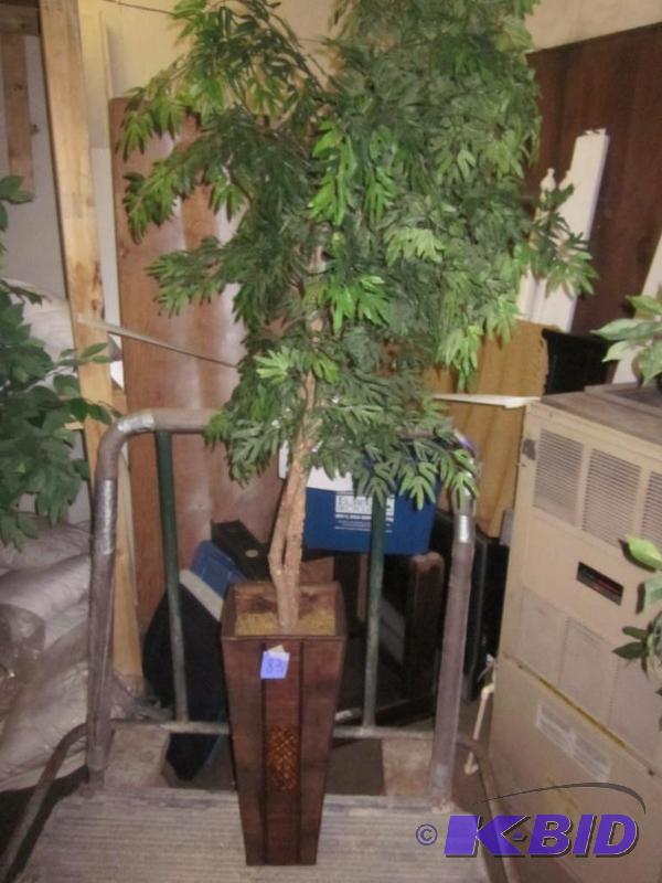 Artificial tree in planter.  &nbsp  &nbsp...