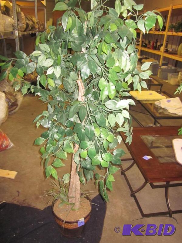 Artificial tree in planter.  &nbsp  &nbsp...
