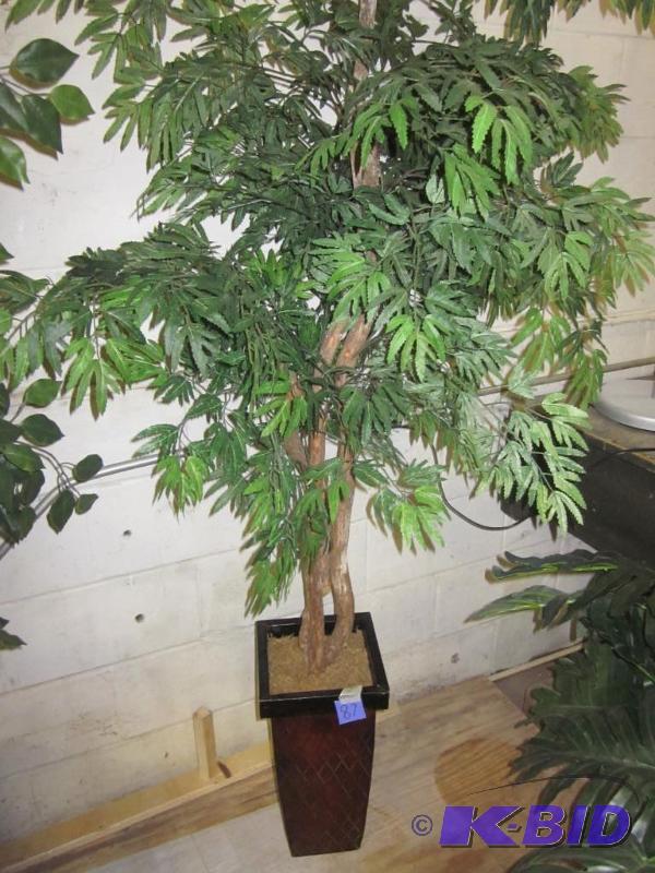 Artificial tree in planter.  &nbsp  &nbsp...