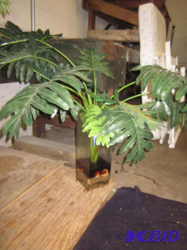 Artificial plant in glass vase.  &nbsp  &nbs...