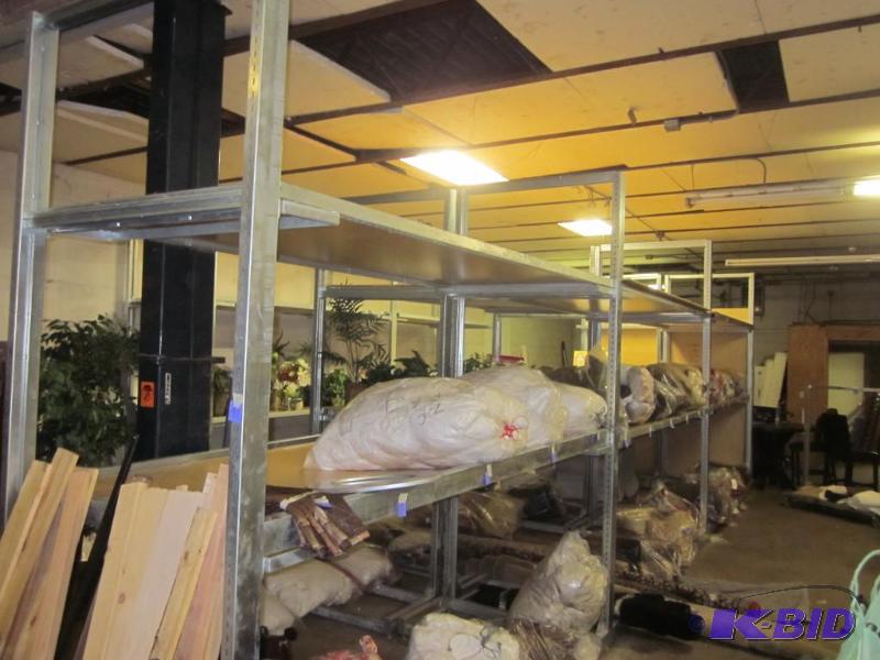 Seven two tier metal rack system with support...