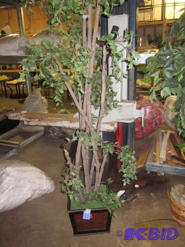 Artificial tree in planter.  &nbsp  &nbsp...