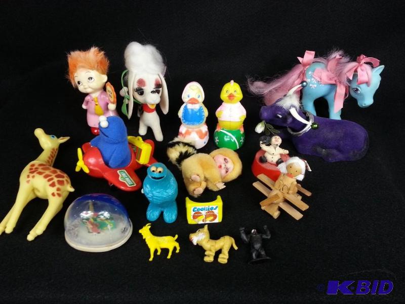lot 23 image: Lot of Vintage Toys Including a 1983 My Little Pony  Seasme Street Cookie Monster