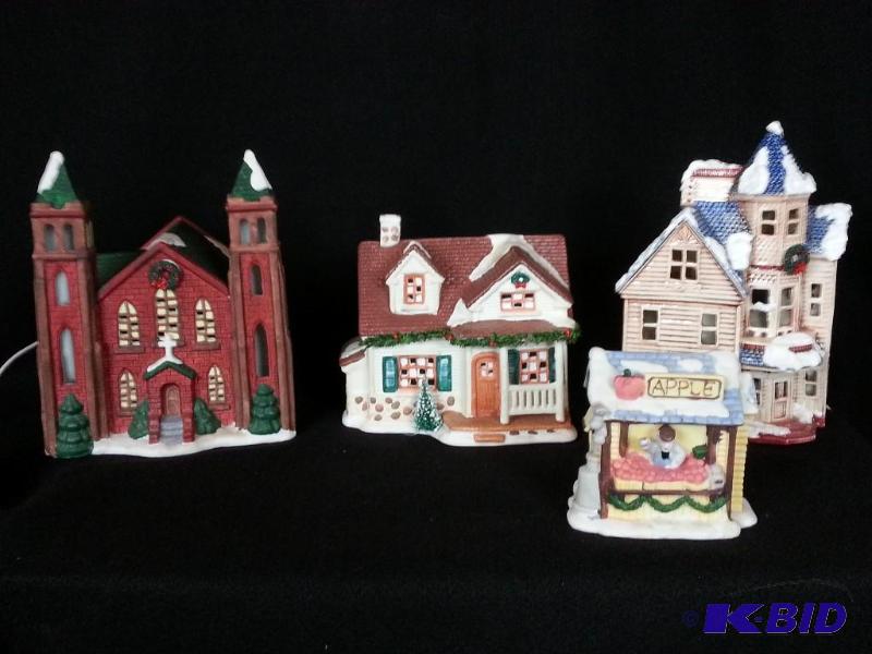 lot 72 image: Set of (4) Christmas Village Pieces - Church, Apple Stand, Two Houses