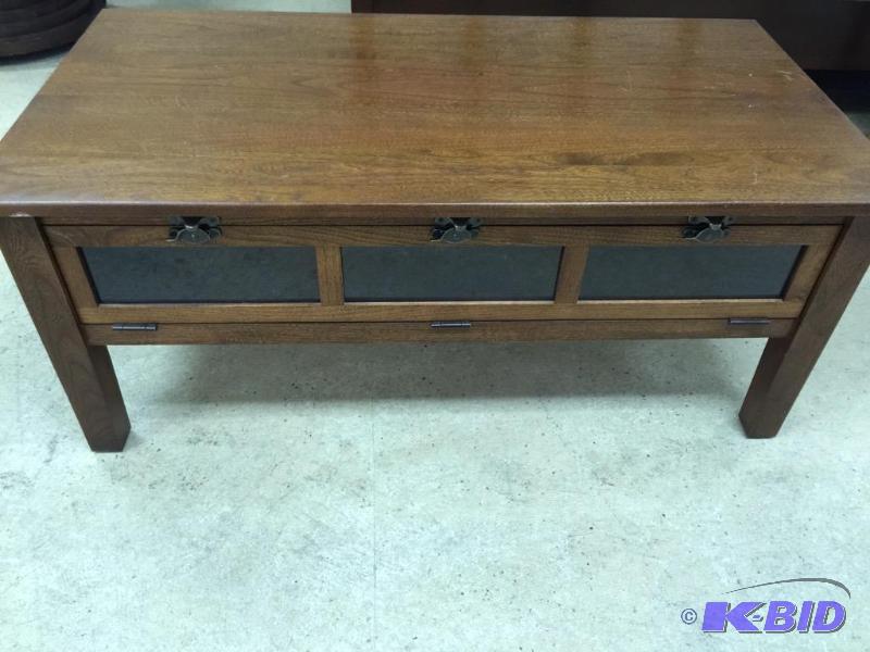 lot 30 image: Wooden Drop Front Glass Coffee Table