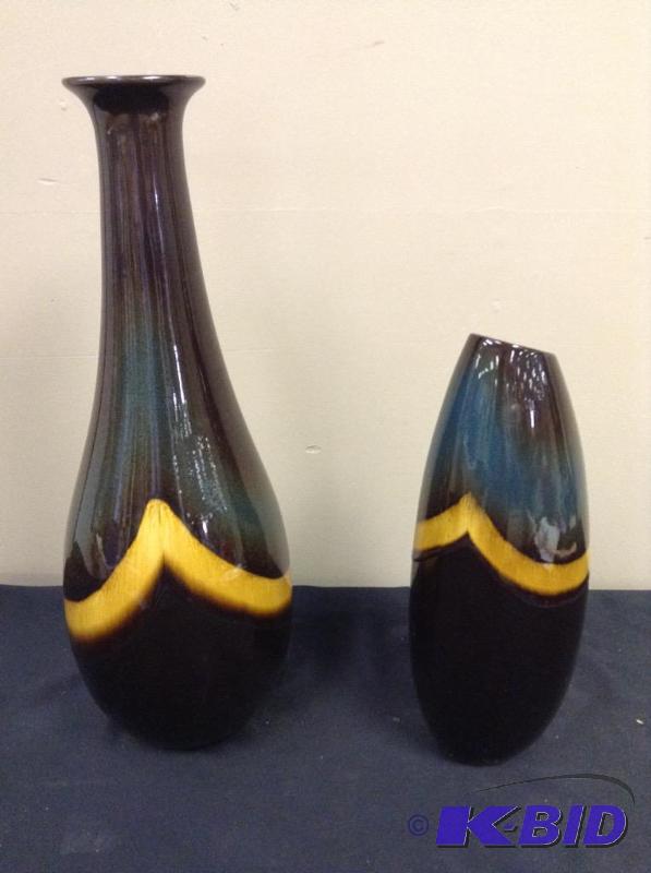 lot 65 image: Lot of two vases from model home brown and blue angle design
