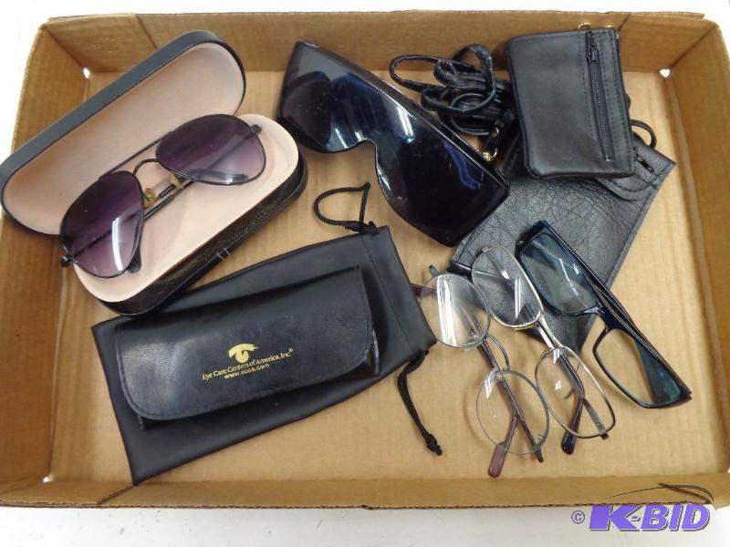 lot 115 image: Sun glasses & cases   4 cases  1 pair avi...
