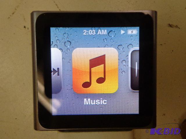 lot 16 image: &nbsp14 GB I-Pod Mini   1" x 1" Co...
