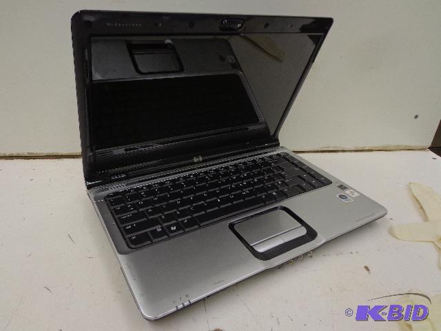 lot 21 image: HP Laptop computer   13" x&nbsp10"...