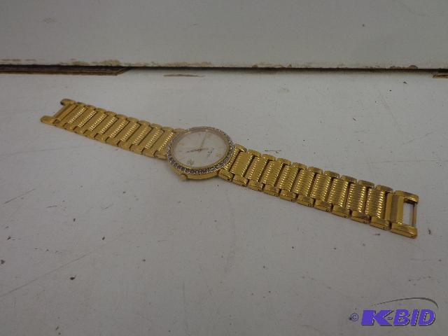 lot 49 image: Gold woman&nbspwatch   Wittnauer brand  Seve...