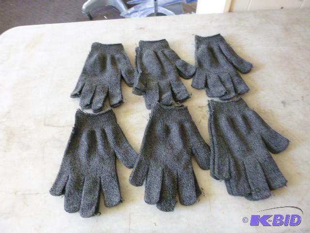 Six Pairs of One Size Fits All Gloves...