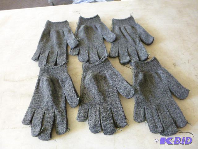 Six Pairs of One Size Fits All Gloves...