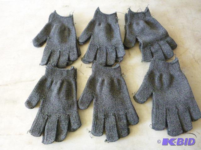 Six Pairs of One Size Fits All Gloves...