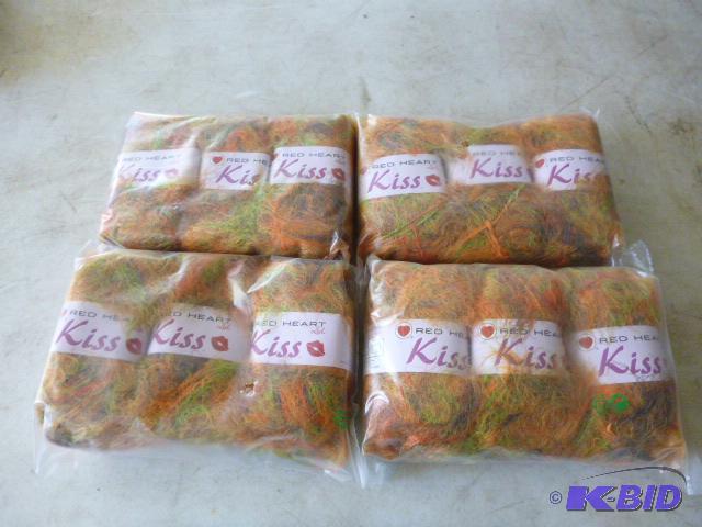 Four Packs of 3 Red Heart Kiss Yarn...