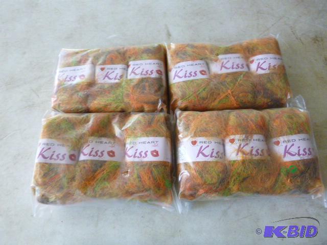 Four Packs of 3 Red Heart Kiss Yarn...