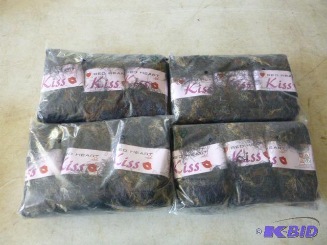 Four Packs of 3 Red Heart Kiss Yarn...