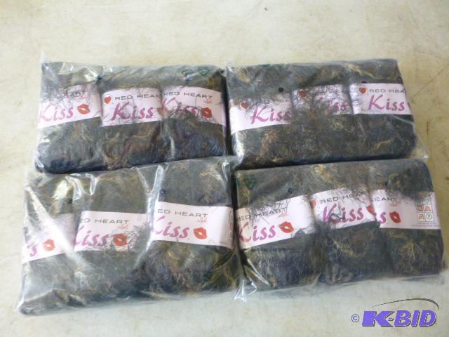 Four Packs of 3 Red Heart Kiss Yarn...