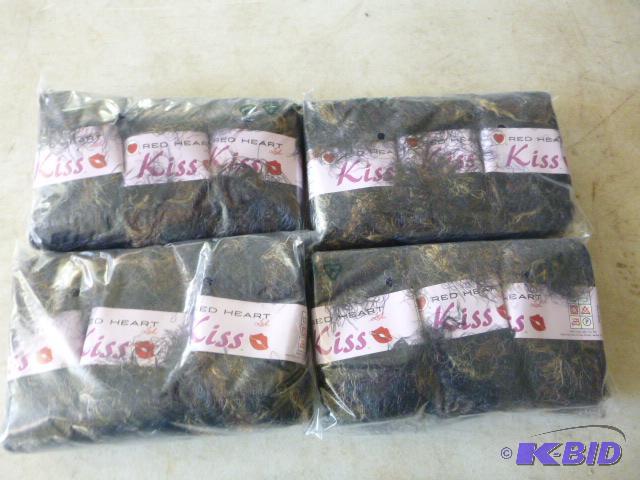 Four Packs of 3 Red Heart Kiss Yarn...