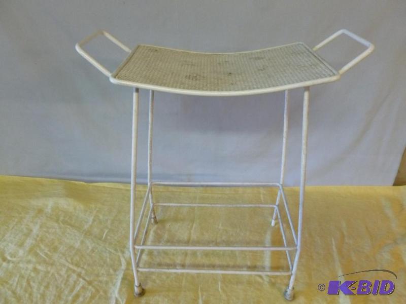 lot 14 image: Vintage all metal t.v stand, measures 25"...