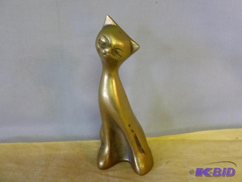 lot 142 image: Vintage cast brass cat figurine that measures...